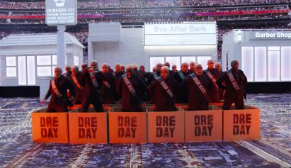 Dancers standing on the stage of the Super Bowl