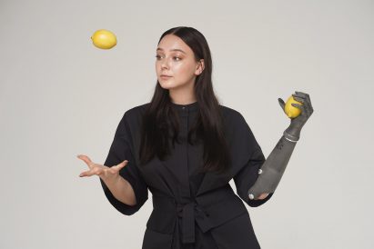 A woman wearing an Esper Hand