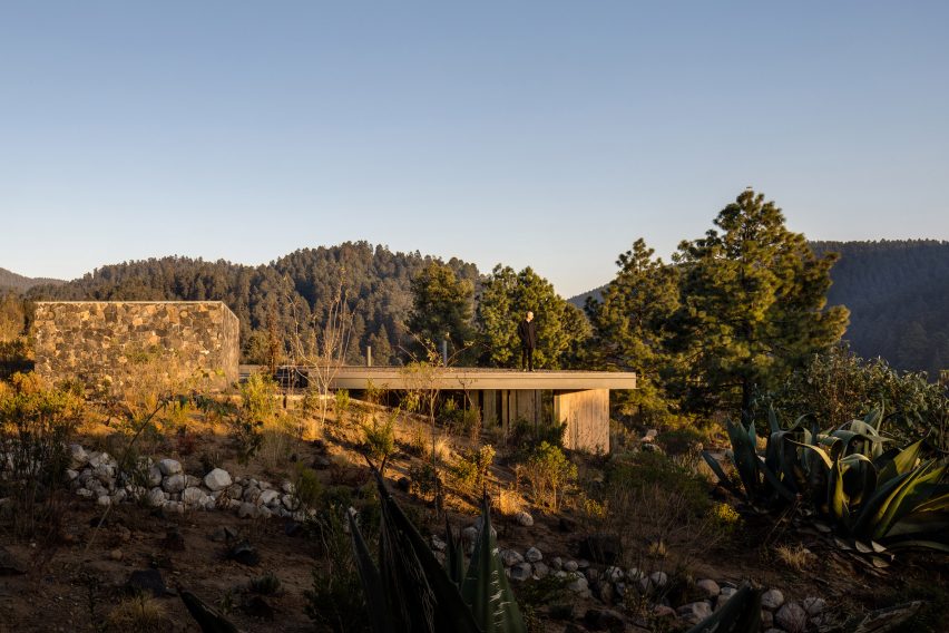 A house embedded in a rugged hill