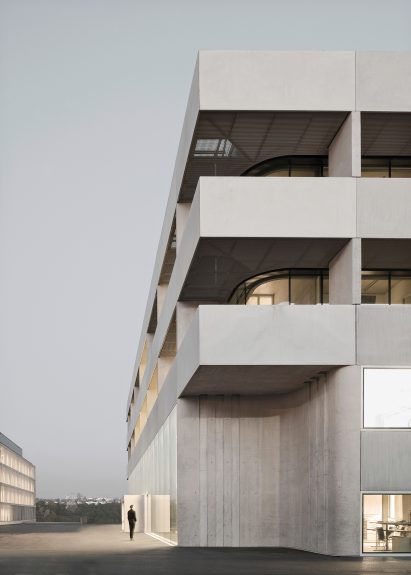 Different textured concrete covers the exterior