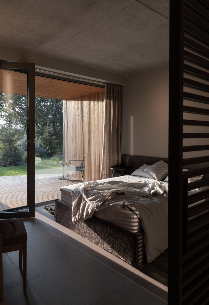 Bedroom in the Terrace with a House by the Lake by UGO