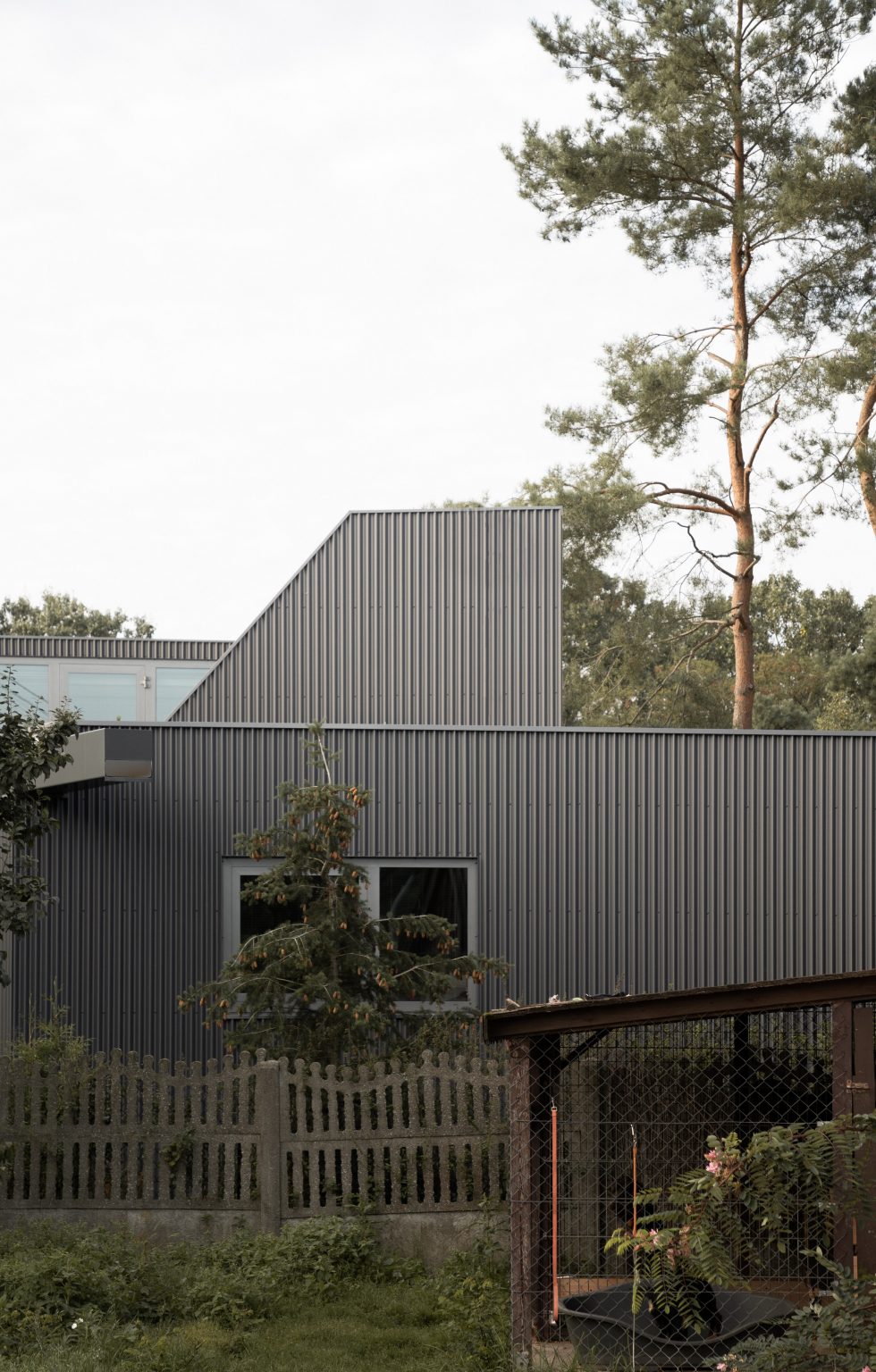House clad with corrugated metal