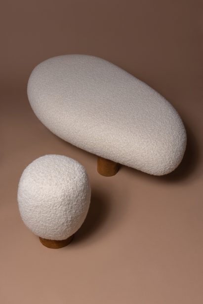 Overhead shot of rotund bench and stool with white woollen seat by Mari Koppanen