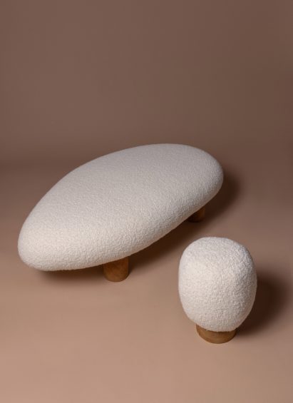 Overhead shot of rotund bench and stool with white woollen seat by Mari Koppanen