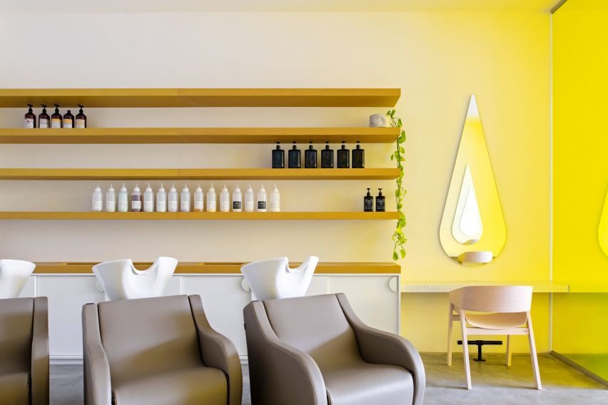 Hair washing stations with timber shelving at Mitch Studio hair salon