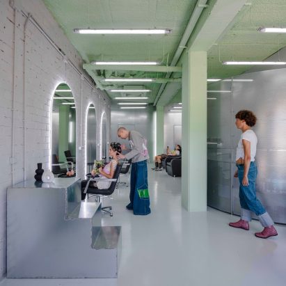 Mood hair salon in Madrid features galvanised steel elements mint green ceilings and arched mirrors