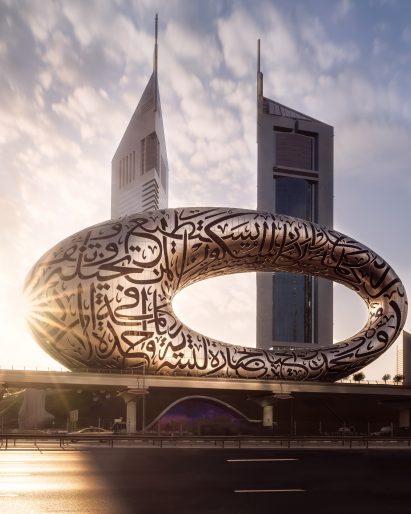 Dubai's elevated train line with Emirates Towers and Museum of the Future