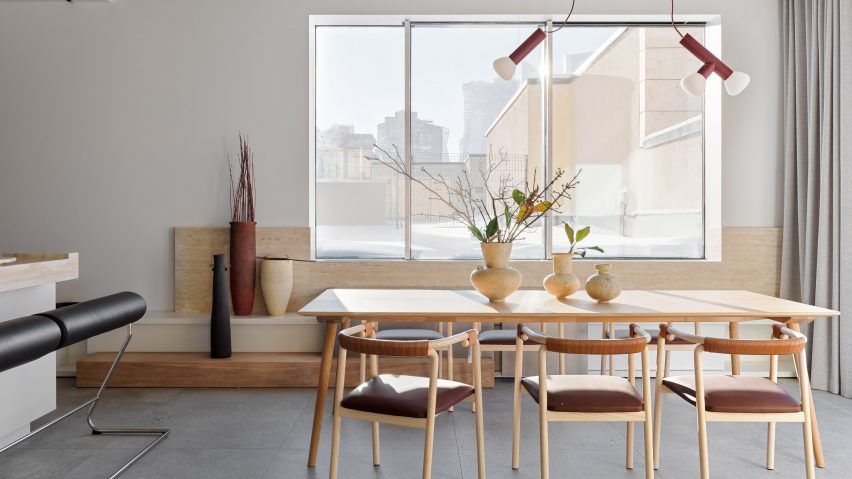 A wooden dining table in RS D apartment
