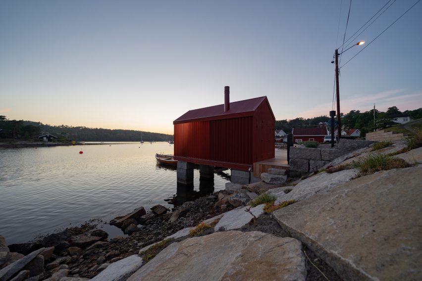 Red cabin on Norwegian seafront