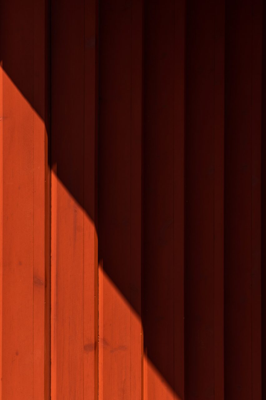 Red-painted wood cladding