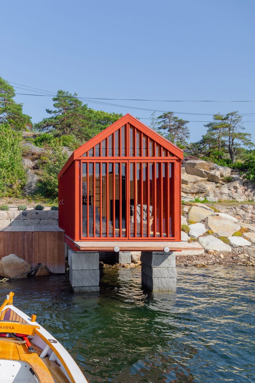 Red cabin on Norwegian seafront