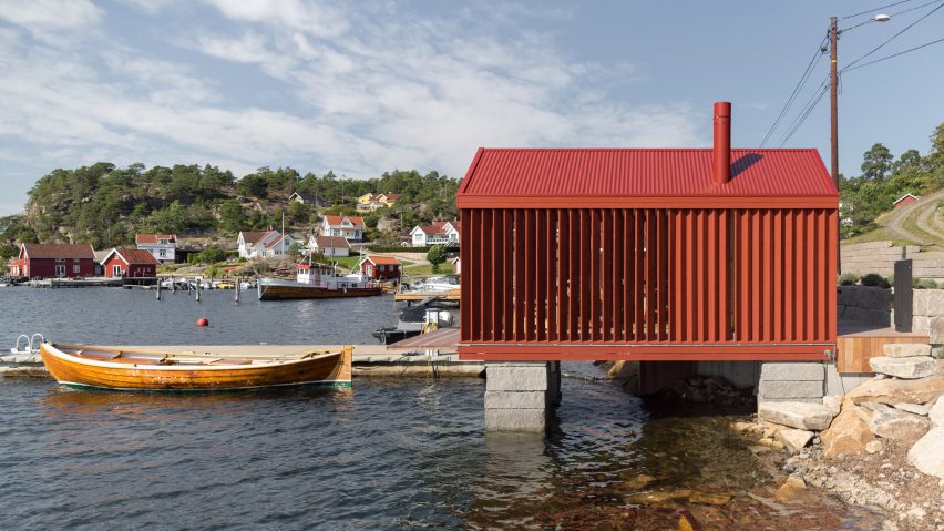 Red cabin on a seafront in Norway