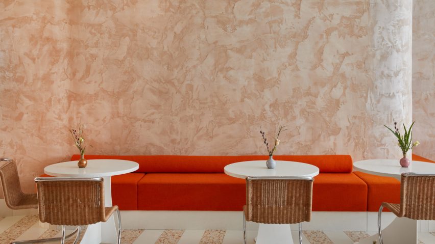 Red banquette seating at Ottolenghi Chelsea