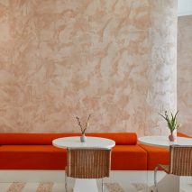 Red banquette seating at Ottolenghi Chelsea