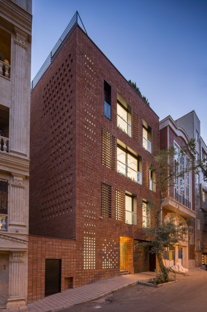 Residential building with brick and glass facade