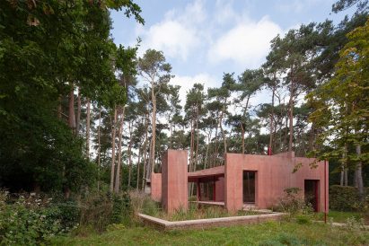 Exterior of the Refuge by NWLND Rogiers Vandeputte but red concrete pavilion walls and overflow pond
