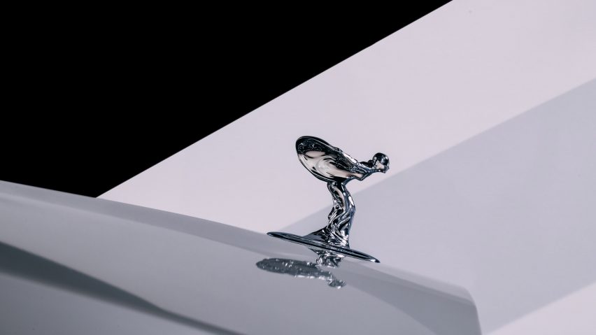 A silver Spirit of Ecstasy figurine
