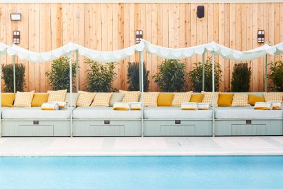 Cabana beds flanking the swimming pool