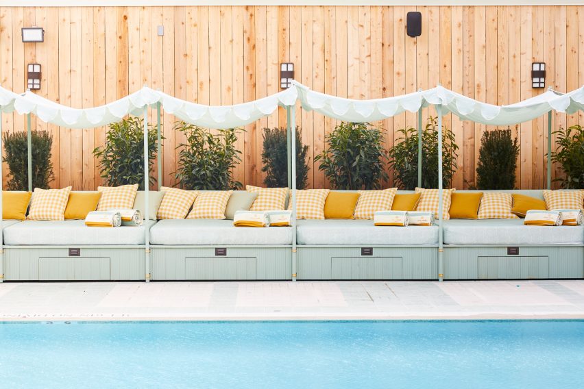 Cabana beds flanking the swimming pool