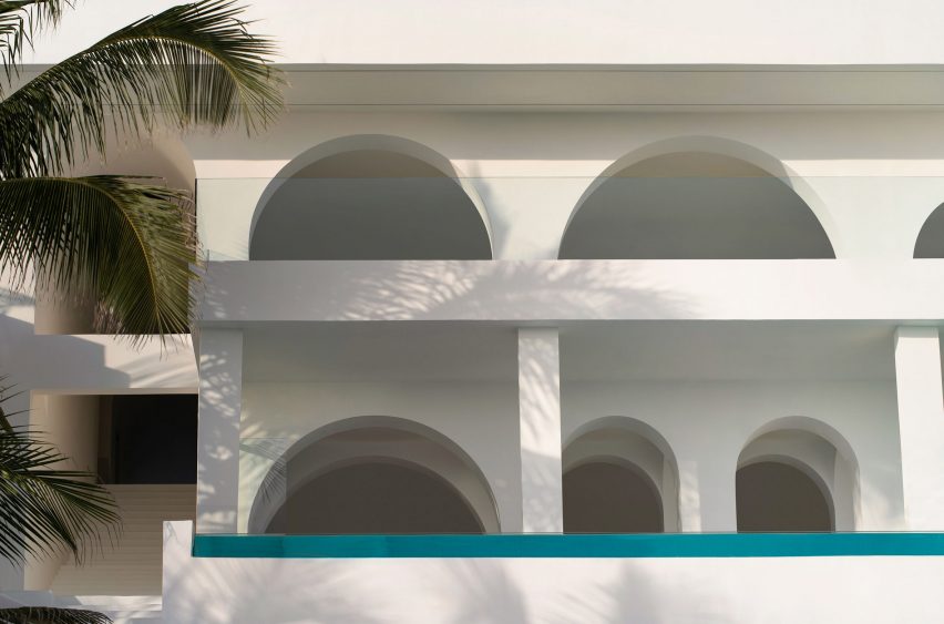 Arch windows punctuate Sumei Skyline Coast hotel by GS Design