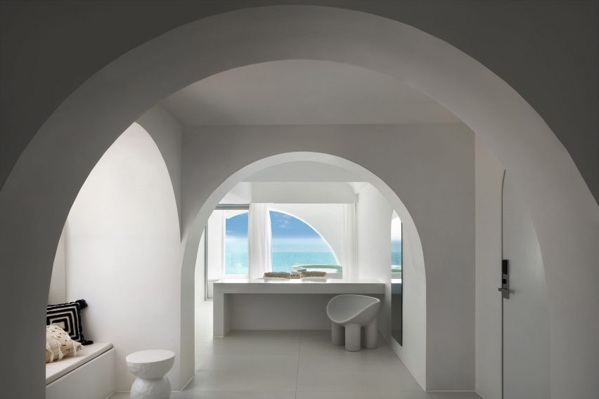 Sumei Skyline Coast hotel by GS Design features white interiors