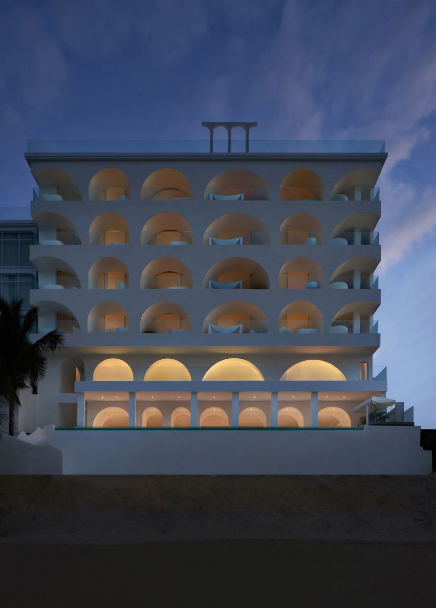 Arch windows punctuate Sumei Skyline Coast hotel by GS Design