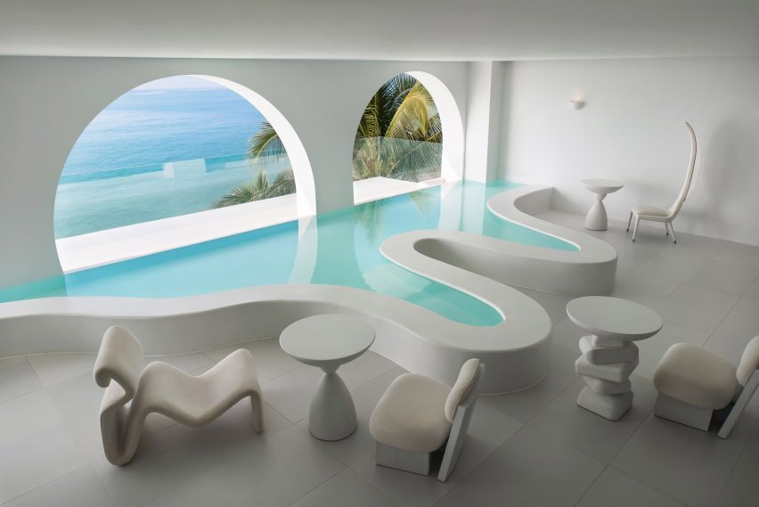 Sumei Skyline Coast hotel by GS Design features white interiors