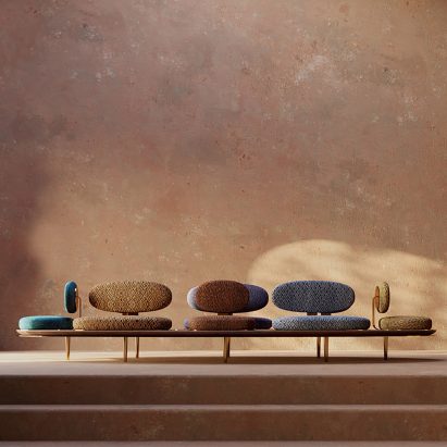 Low-lying Tribu sofa with multi-coloured pebble-shaped seats by Studioforma