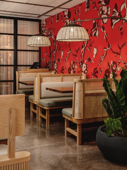 Bright red wallpaper behind the tables