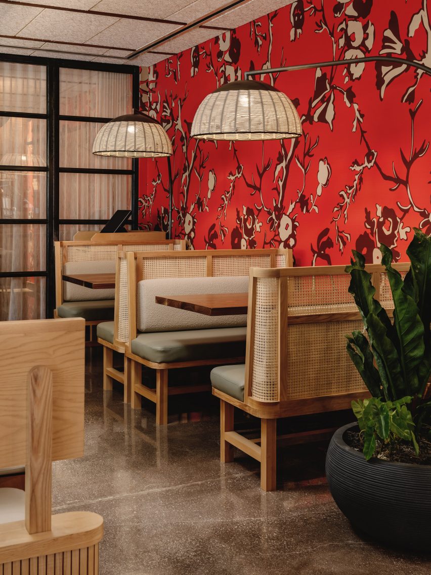 Bright red wallpaper behind the tables