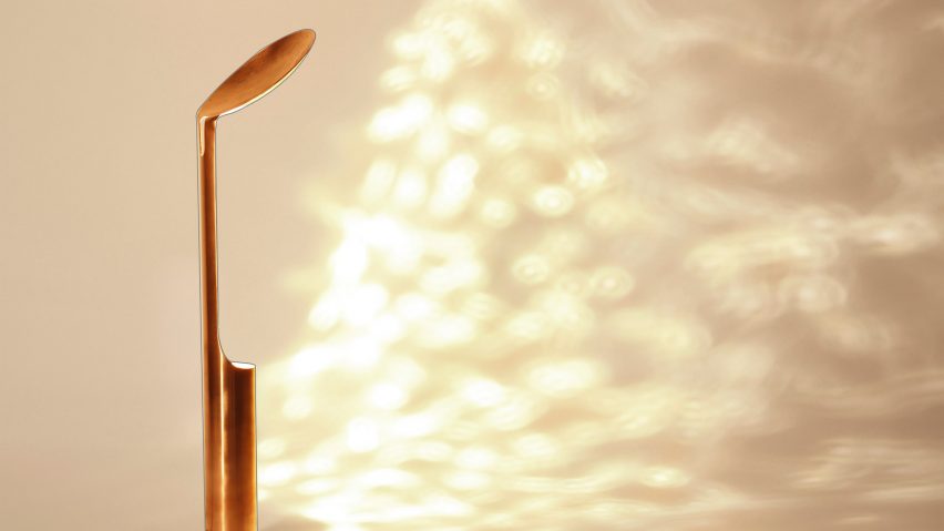 Bronze table lamp on a white background