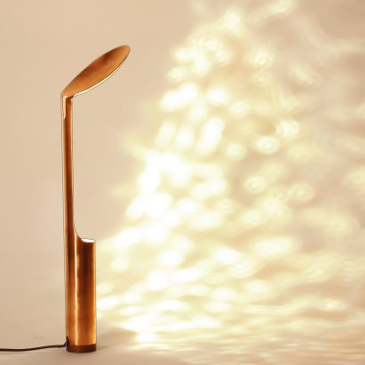 Bronze table lamp on a white background