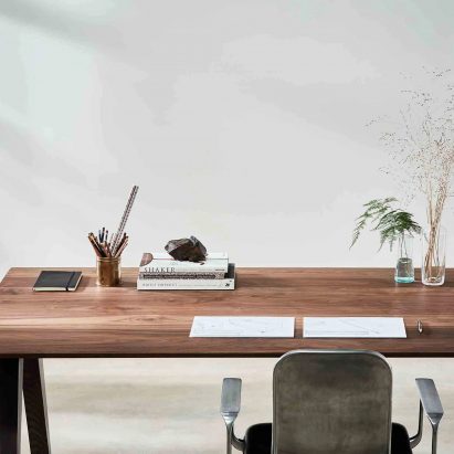 A photograph of the wooden Victoria table by Benchmark