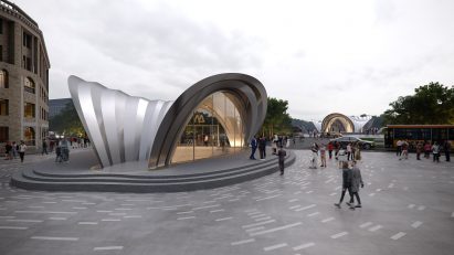 Steel entrance pavilion surrounded by a public plaza
