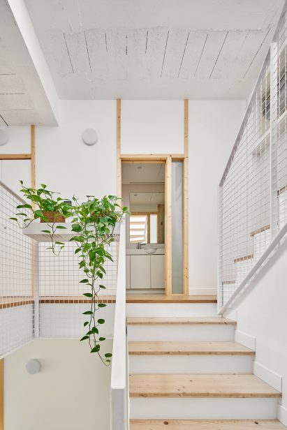 White stairwell with metal balustrades