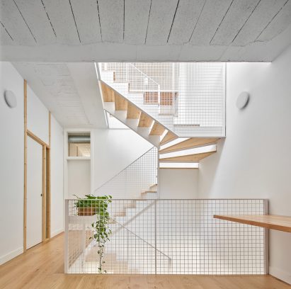 White stairwell with metal balustrades