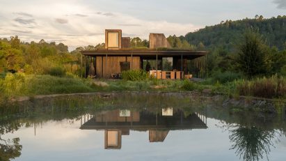 exterior Rain Gathering house and pond