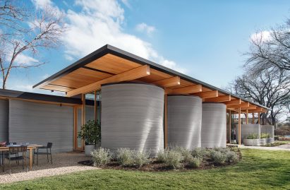 Concrete 3d printed building with wood roof