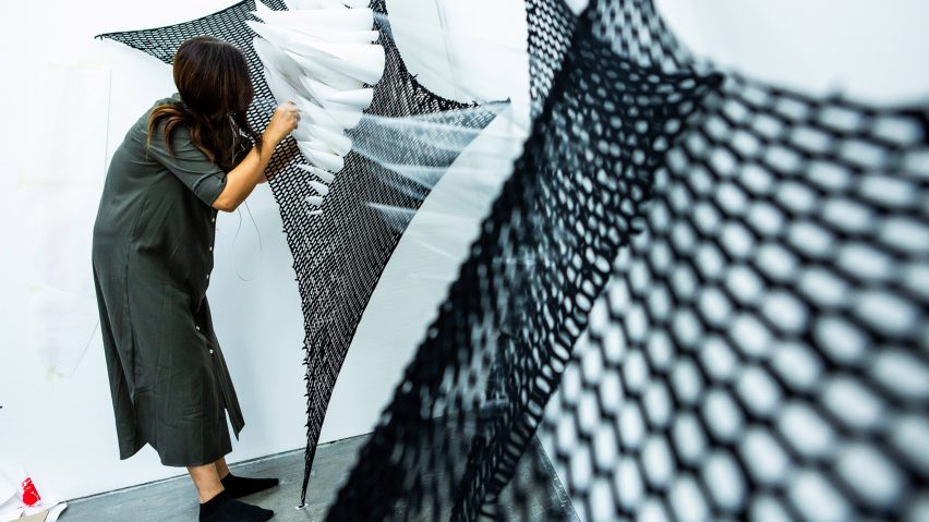 Royal College of Art design student project consisting of mesh fabric stretched across a room