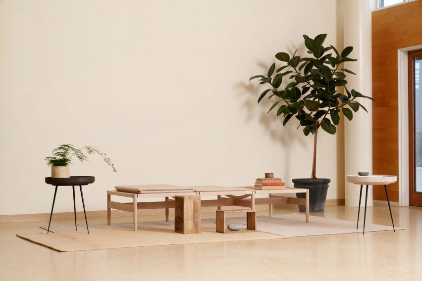 Two side tables by Ayush Kasliwal next to a wooden bench