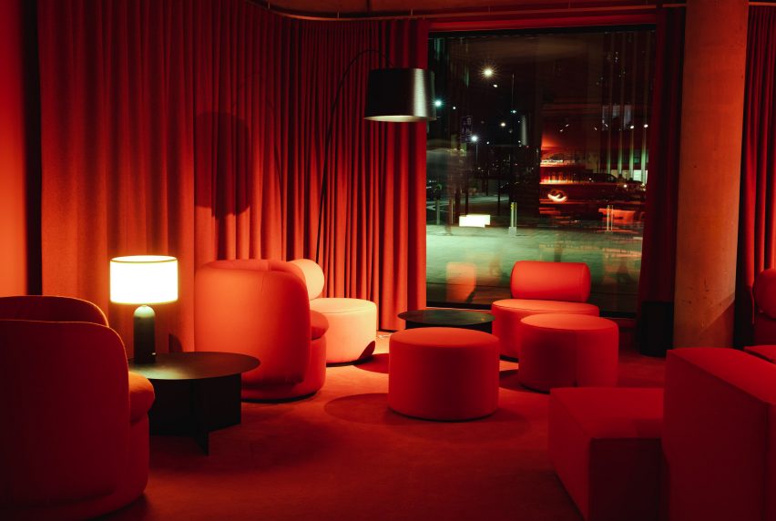 Red salon in Bureau in Greenwich Design District by Roz Barr Architects