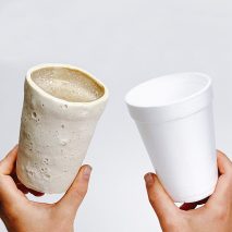 Chitofoam cup by Doppelgänger made from mealworm exoskeleton next to a polystyrene cup