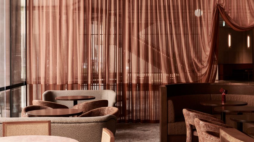 Dame interior with theatrical pink curtain