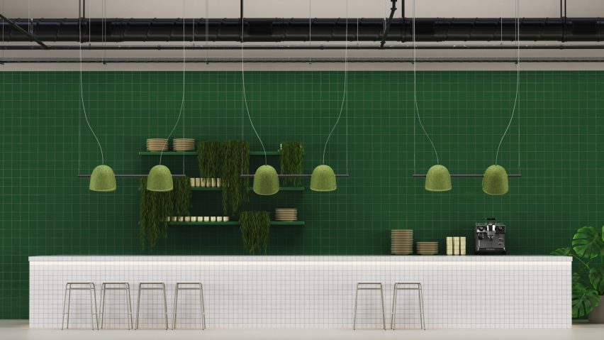 Green felt lights hanging above a white counter