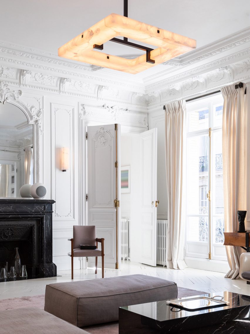 Embrun square chandelier by Ozone in a decorated white living room