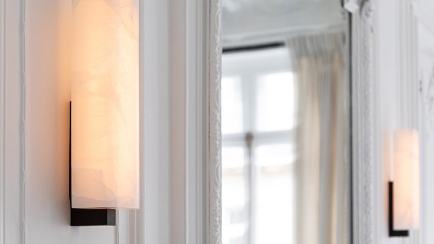 Two Embrun by Ozone wall lights on white walls
