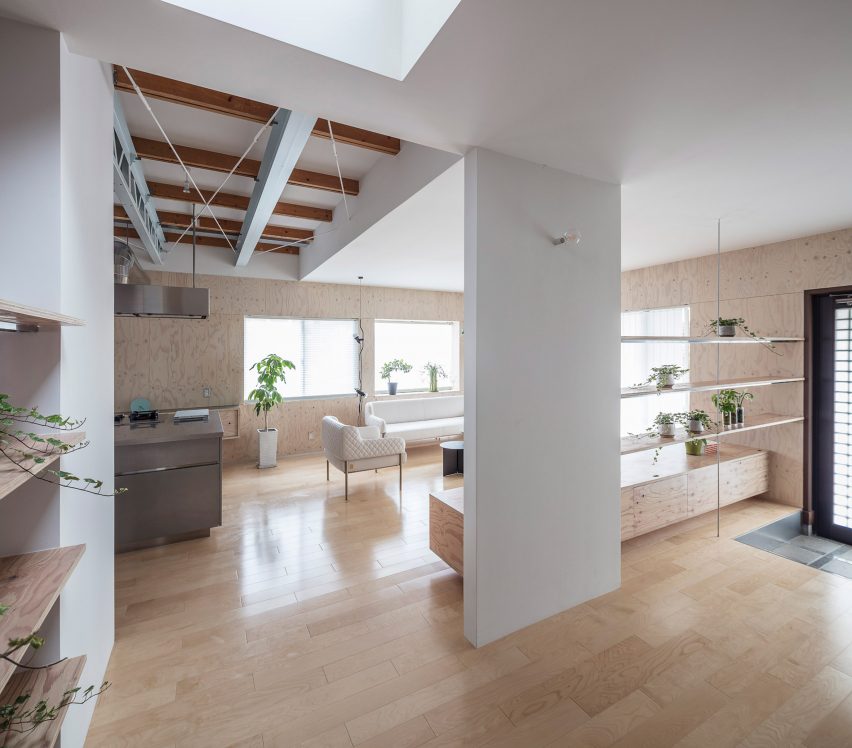 Wooden flooring in House in Honjo by Jorge Almazán Architects