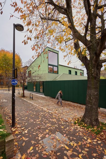 Dark green boundary wall surrounds the perimeter of The Hitth
