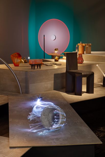 A light installation is sprawled across a wooden sheet at Inferences/Inferencias