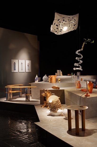 Collection of pieces are displayed across different heights